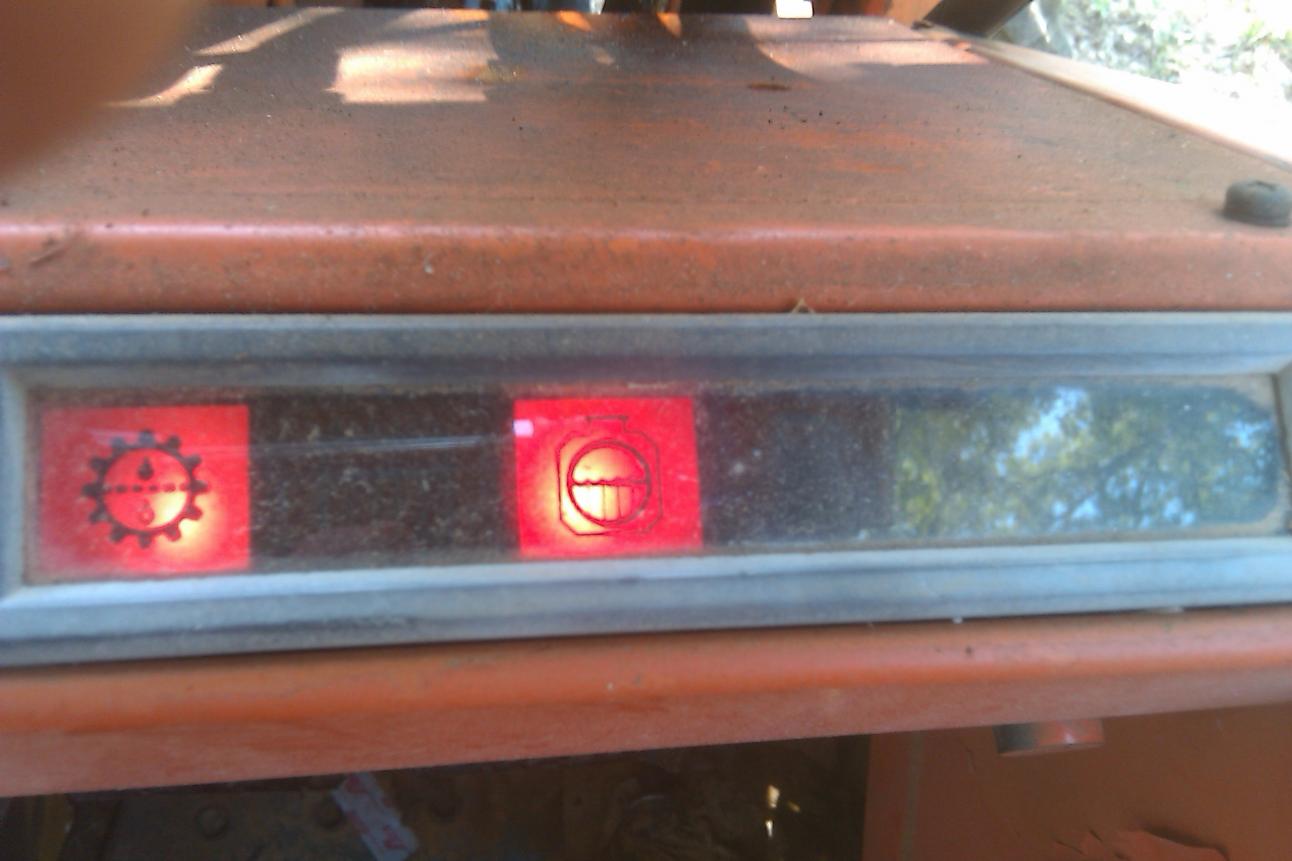 Can anyone tell me what these warning lights mean? OrangeTractorTalks