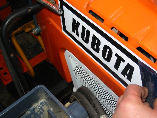 Applying new decals For applying the longer decals to your Kubota, pre-wet the area with Windex before applying. This will give you a chance to position the decal a bit better without having to worry about getting the exact right away. Press the excess out with a squeege and the job is done.