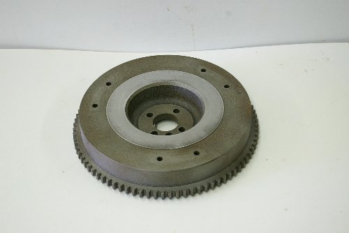 Flywheel Flywheels in your Kubota are 1.5-2" thick and typically weigh around 40-50lbs. They store momentum which steadies varying amounts of torque placed on the input shaft of the transmission by the engine.