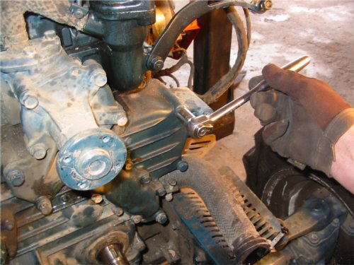 Removing Gear Case Cover When removing the gear case cover, lable each nut as it is removed and create a diagram of their location. Each bolt is a different length and taking the time to write the locations down will save time on reassembly later.