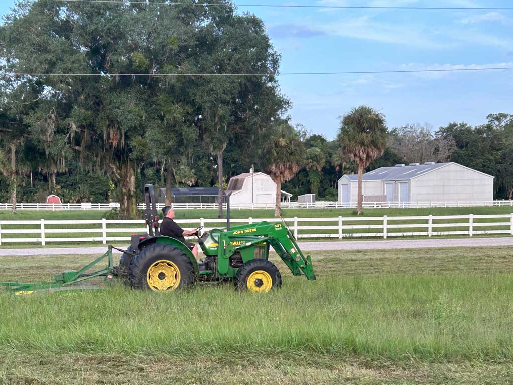 1024x768-John-on-the-John-Deere.jpg