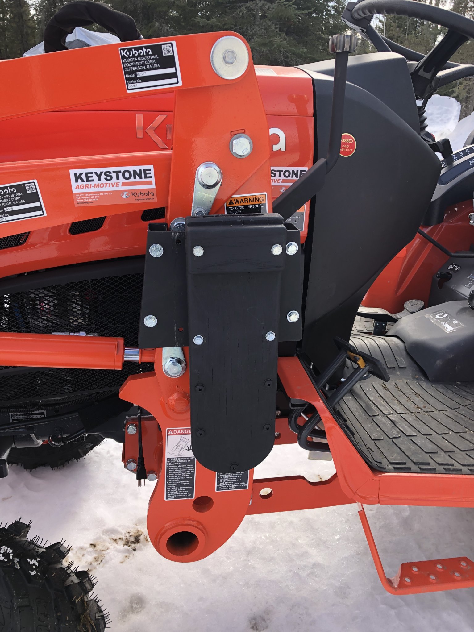 Chain saw mount on my Lx2610, one of a few things I've done...so far