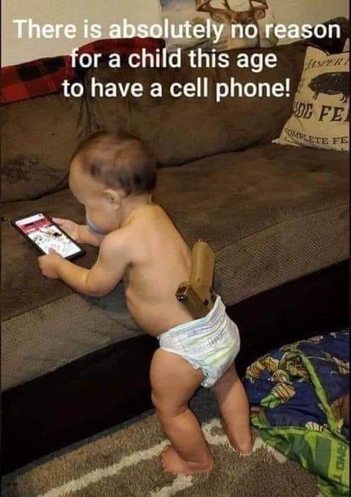 jbaby cellphone & pistol.jpg
