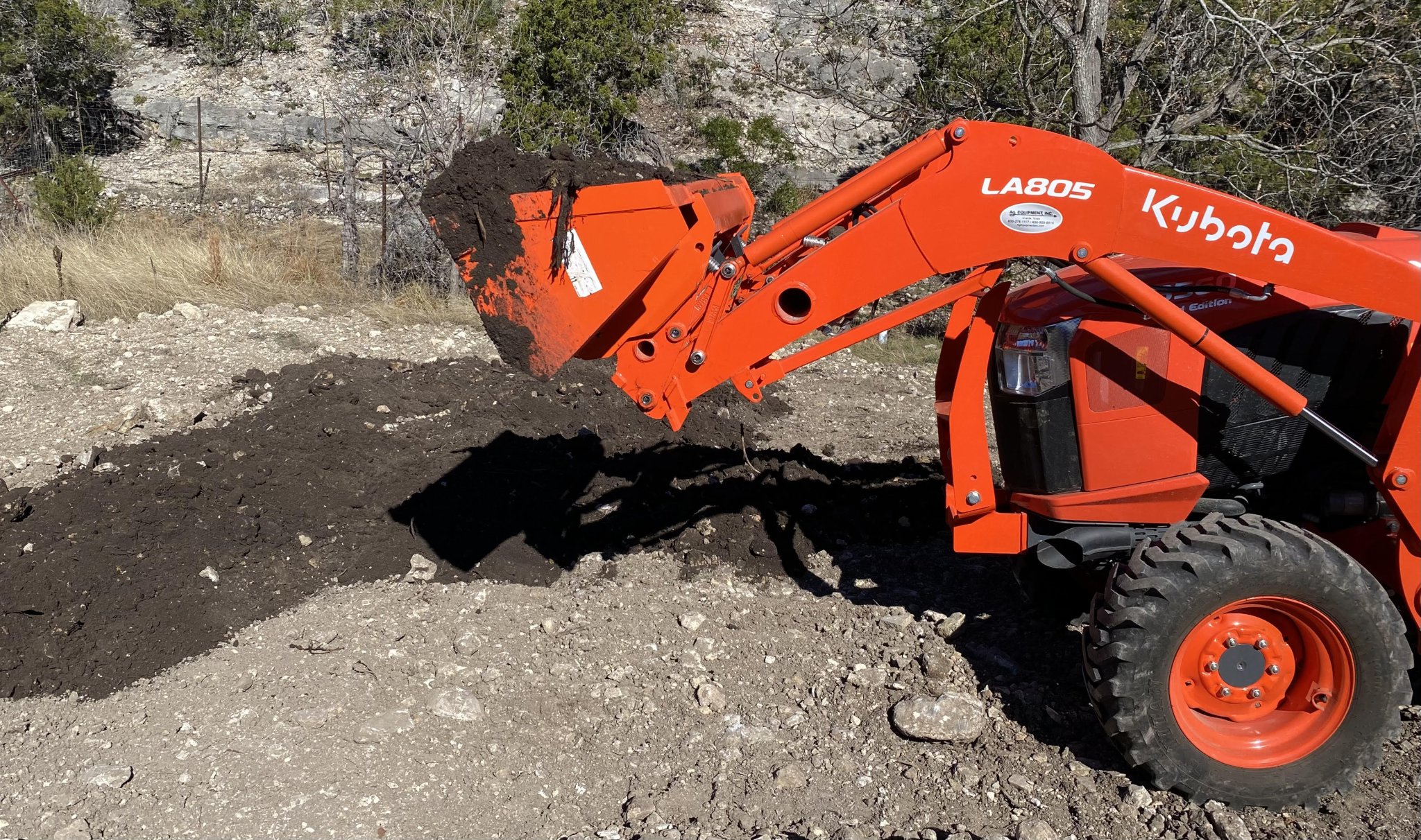 spreading topsoil.jpg