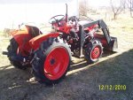 Tractor and sunset 12.13.10 002.jpg