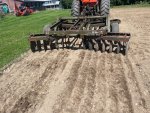 M6800 discs set to scratch soil for planting .jpg