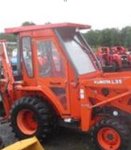 SMALL PIC Cab on Tractor.JPG